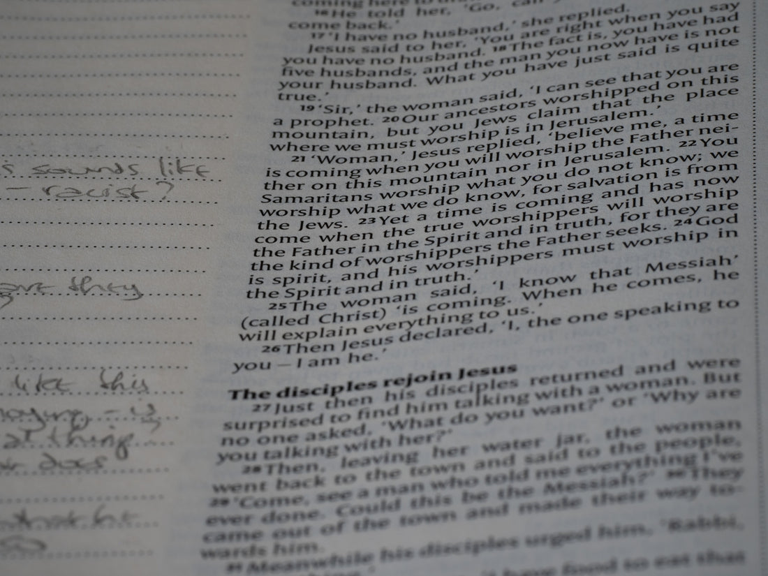 A close up of a book with writing on it