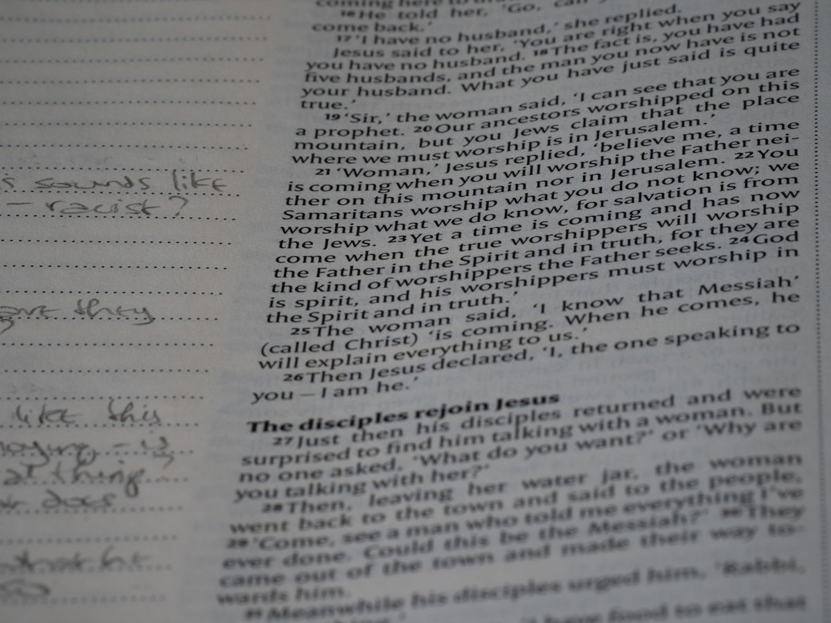 A close up of a book with writing on it