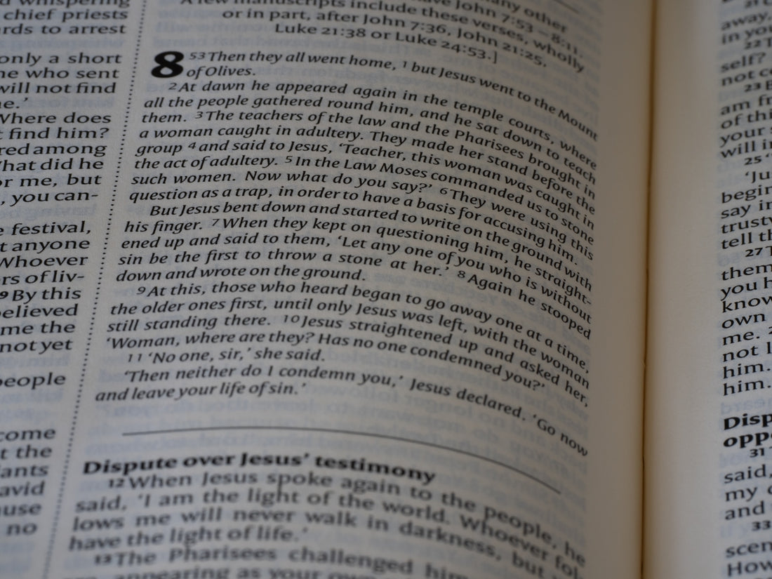 A close up of an open book with text